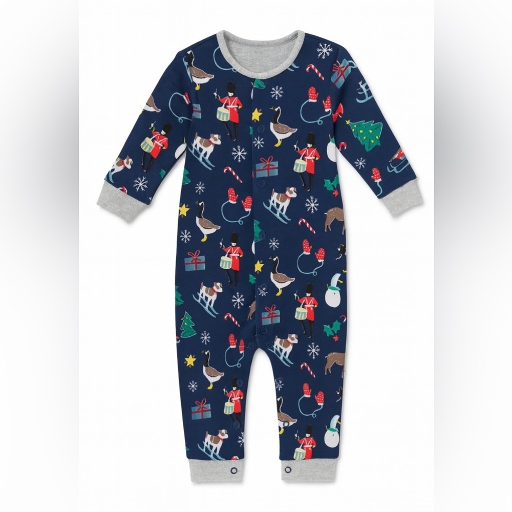Mini Boden baby sleeper with a holiday-themed Toy Soldier print